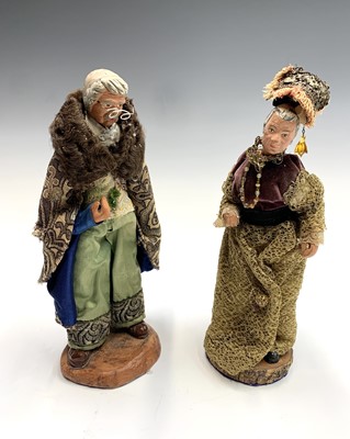 Lot 236 - A pair of terracotta figures dressed in...