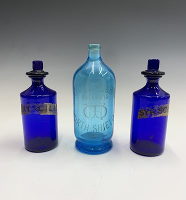 Lot 998 - An early 20th century blue glass chemist's...