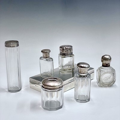 Lot 20 - A small Edwardian cut glass flask with silver...