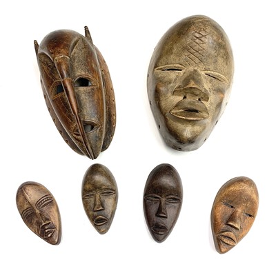Lot 169 - A carved face mask, Cameroon, 20th century,...