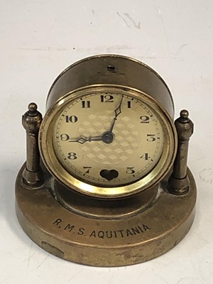 Lot 15 - A brass travel clock, inscribed R.M.S...