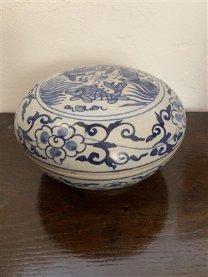Lot 180 - A blue and white pottery bowl and cover,...