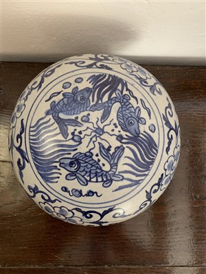 Lot 180 - A blue and white pottery bowl and cover,...