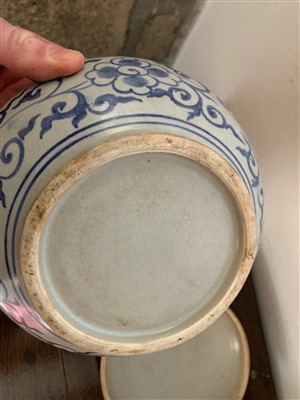 Lot 180 - A blue and white pottery bowl and cover,...