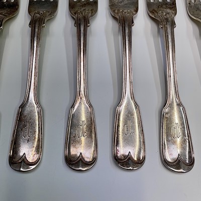 Lot 114 - A set of four silver fiddle and thread crested...