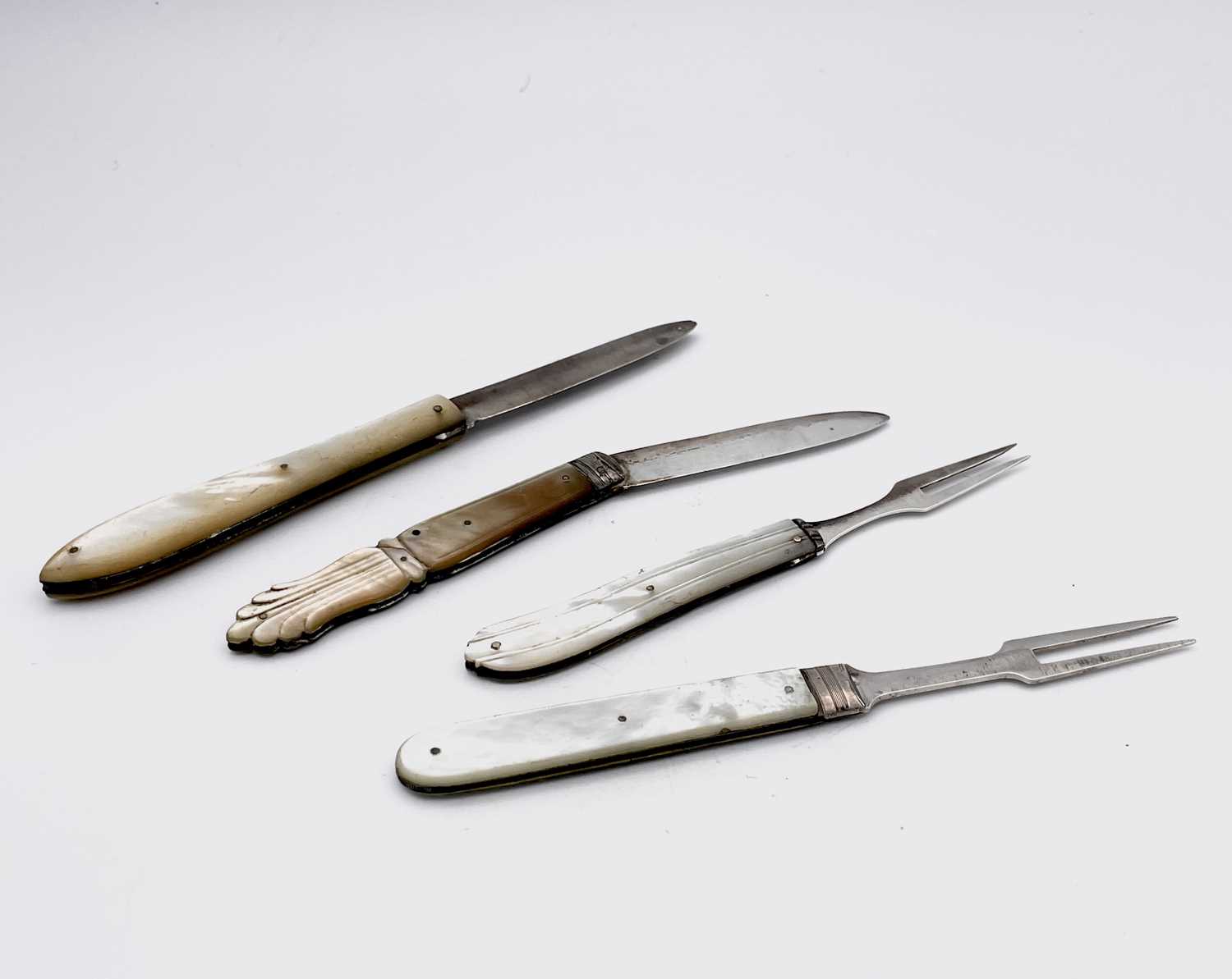 Lot 86 - Two folding fruit forks and two folding fruit...