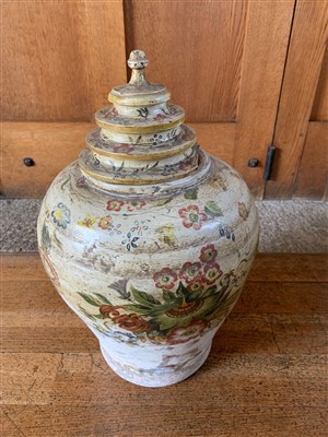 Lot 183 - A floral painted terracotta urn, with...