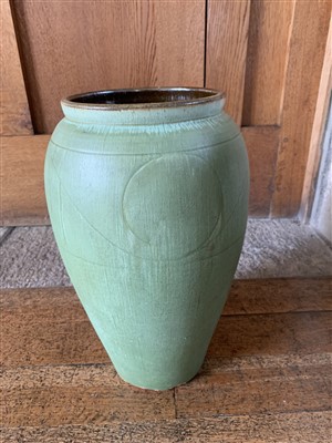 Lot 184 - An Arts and Crafts green glazed pottery vase,...