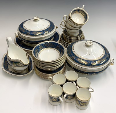 Lot 1039 - A Wedgwood 'Columbia Blue & Gold' dinner, tea...