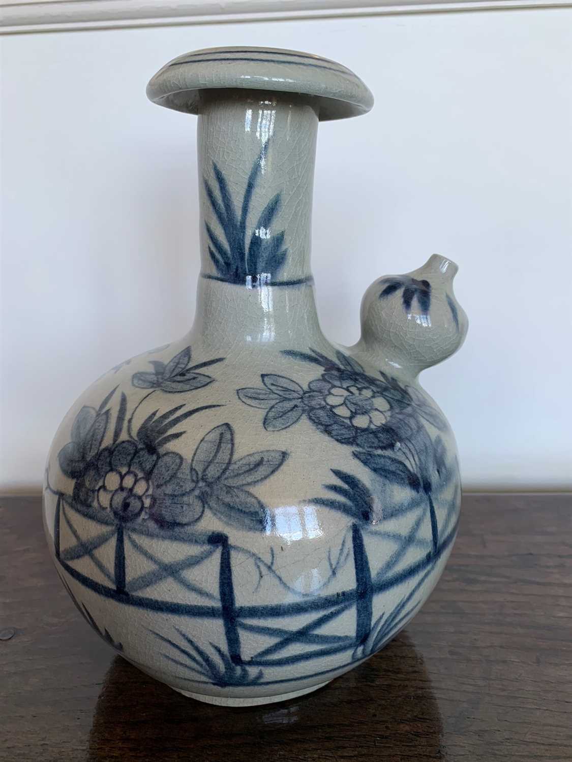 Lot 186 - A Indonesian blue and white kendi.