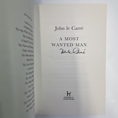 Lot 17 - JOHN LE CARRE. 'A Most Wanted Man,' signed,...