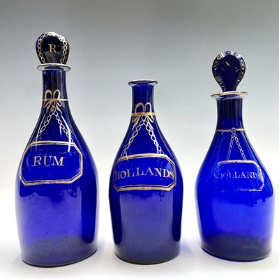 Lot 1032 - Three Georgian Bristol blue decanters and two...