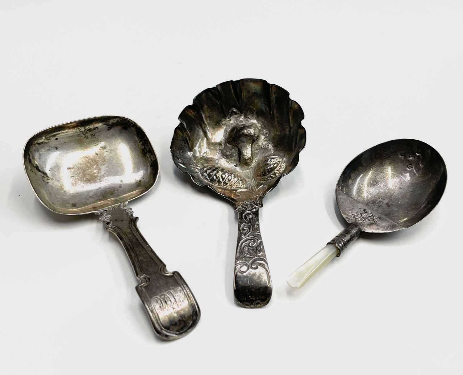 Lot 53 - A silver caddy spoon by Ledsam, Vale & Wheeler...