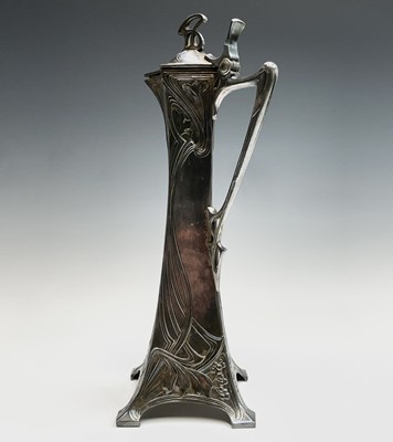 Lot 71 - A WMF Jugendstil tall jug with hinged lid 36.5cm