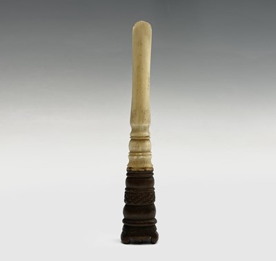 Lot 153 - A rare 18th-century bone and wood apple corer...