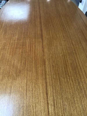 Lot 287 - A retro 1960/70's teak and walnut dining suite,...
