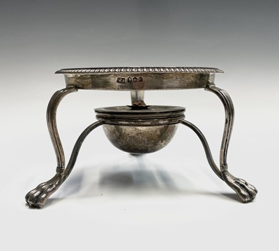 Lot 23 - A George III/IIII silver spirit stand and...