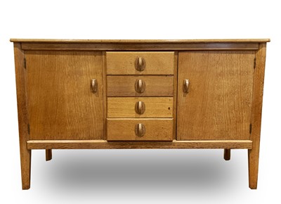 Lot 288 - A Gordon Russell Limited oak sideboard, with...