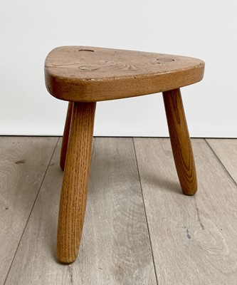 Lot 303 - A Robin Nance elm milking stool, with...