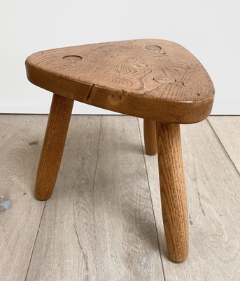 Lot 303 - A Robin Nance elm milking stool, with...