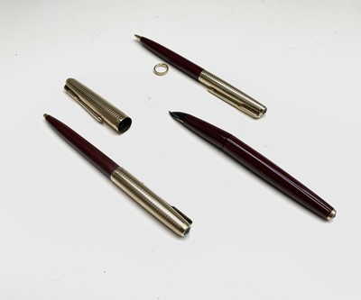 Lot 325 - A Parker 65 Consort red fountain pen ( barrel...