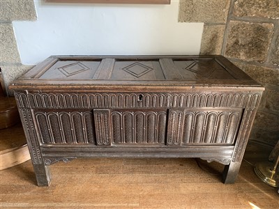 Lot 399 - A carved oak coffer, 17th century, the triple...