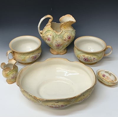 Lot 1074 - A Middleport pottery toilet set, comprising of...