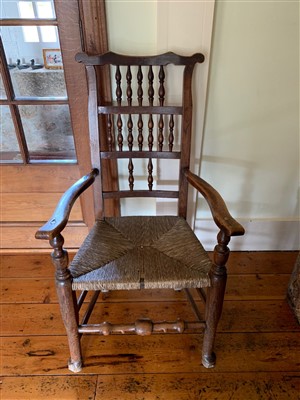 Lot 387 - An ash and elm spindle back armchair, 19th...