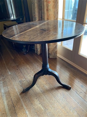 Lot 381 - A George III oak tripod table, the ring turned...