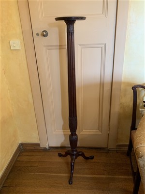 Lot 374 - A 19th century mahogany torchere.