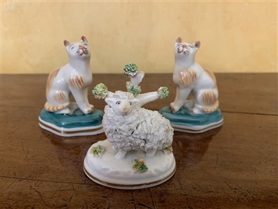 Lot 218 - A pair of Staffordshire porcelain cats and a...