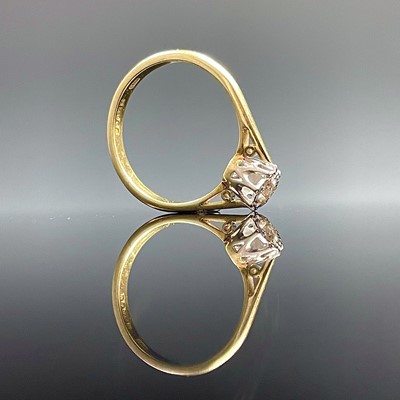 Lot 874 - An 18ct hallmarked gold diamond solitaire ring,...