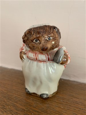 Lot 228 - A Beswick figure 'Miss Tiggywinkle'.