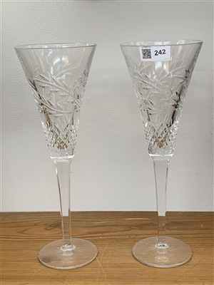 Lot 242 - A pair of Waterford crystal champagne flutes.