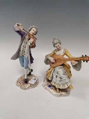 Lot 85 - A pair of Capodimonte porcelain figures,...