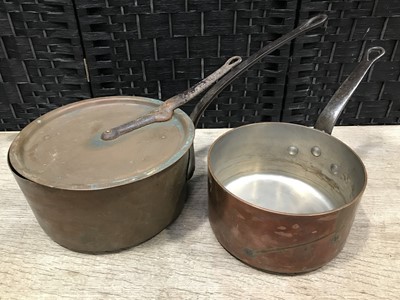 Lot 96 - Two copper sauce pans with wrought iron...