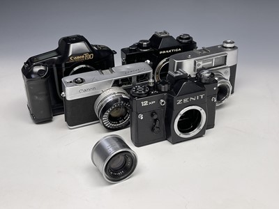 Lot 303 - A collection of assorted SLR and other cameras,...