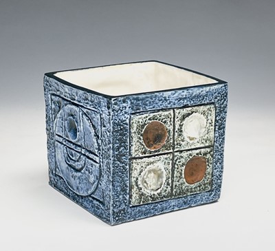 Lot 1091 - A Troika pottery cube vase, the blue ground...