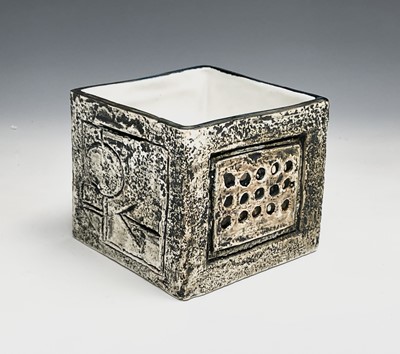 Lot 1092 - A Troika pottery cube vase, the pale ground...