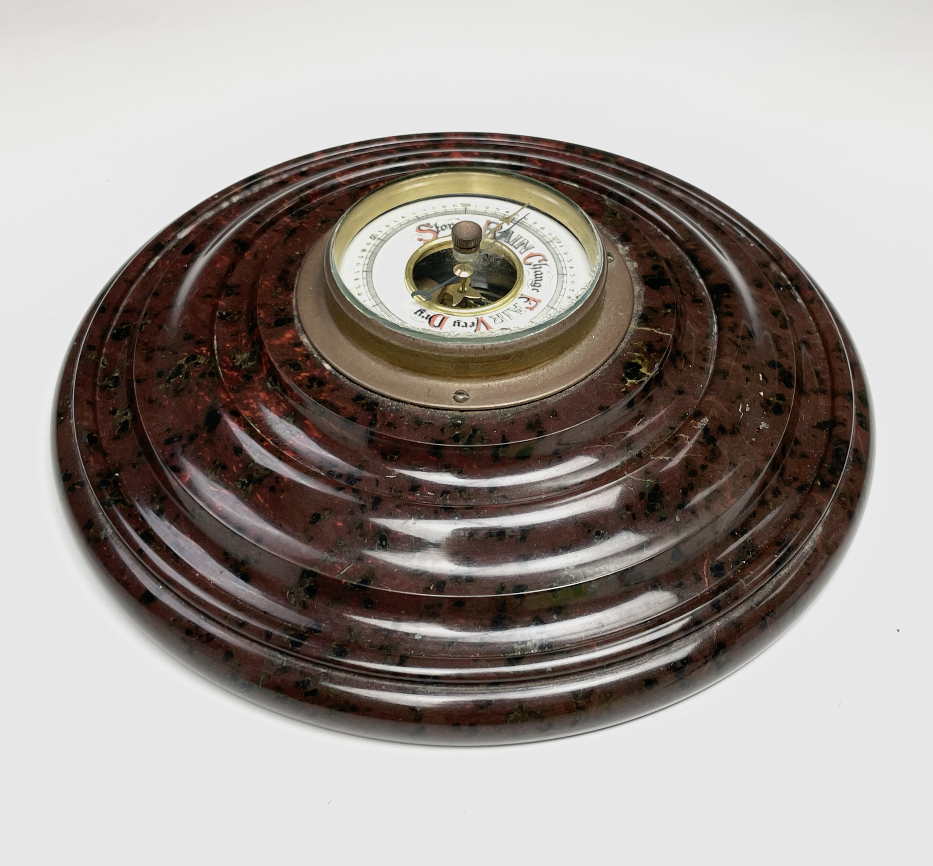 Lot 2925 - A Cornish red serpentine cased aneroid