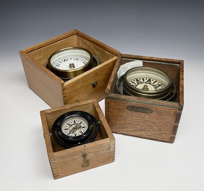 Lot 433 - A gimbal compass, in an oak case with glazed...