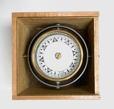 Lot 433 - A gimbal compass, in an oak case with glazed...