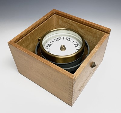Lot 433 - A gimbal compass, in an oak case with glazed...