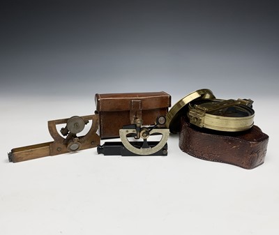 Lot 437 - A prismatic brass surveying compass, late 19th...