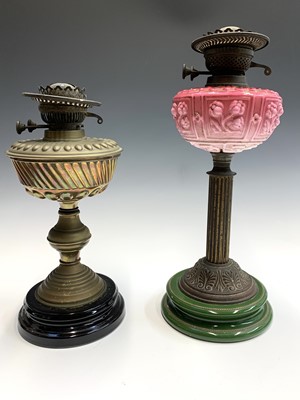 Lot 323 - A Victorian pink opaque glass and brass oil...