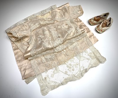 Lot 2838 - An early 20th century pink satin and lace...