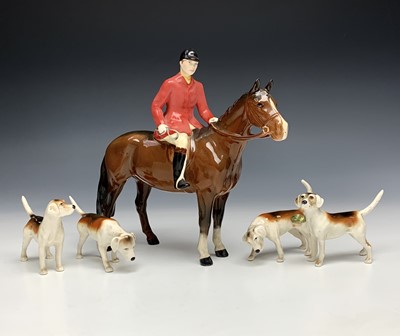 Lot 1107 - A Beswick pottery hunter on horse, height 20cm,...