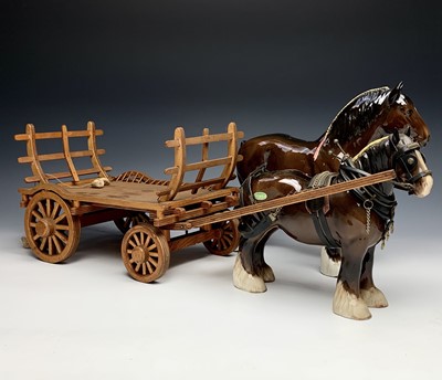 Lot 1108 - A Beswick pottery Shire horse with pink ribbon,...