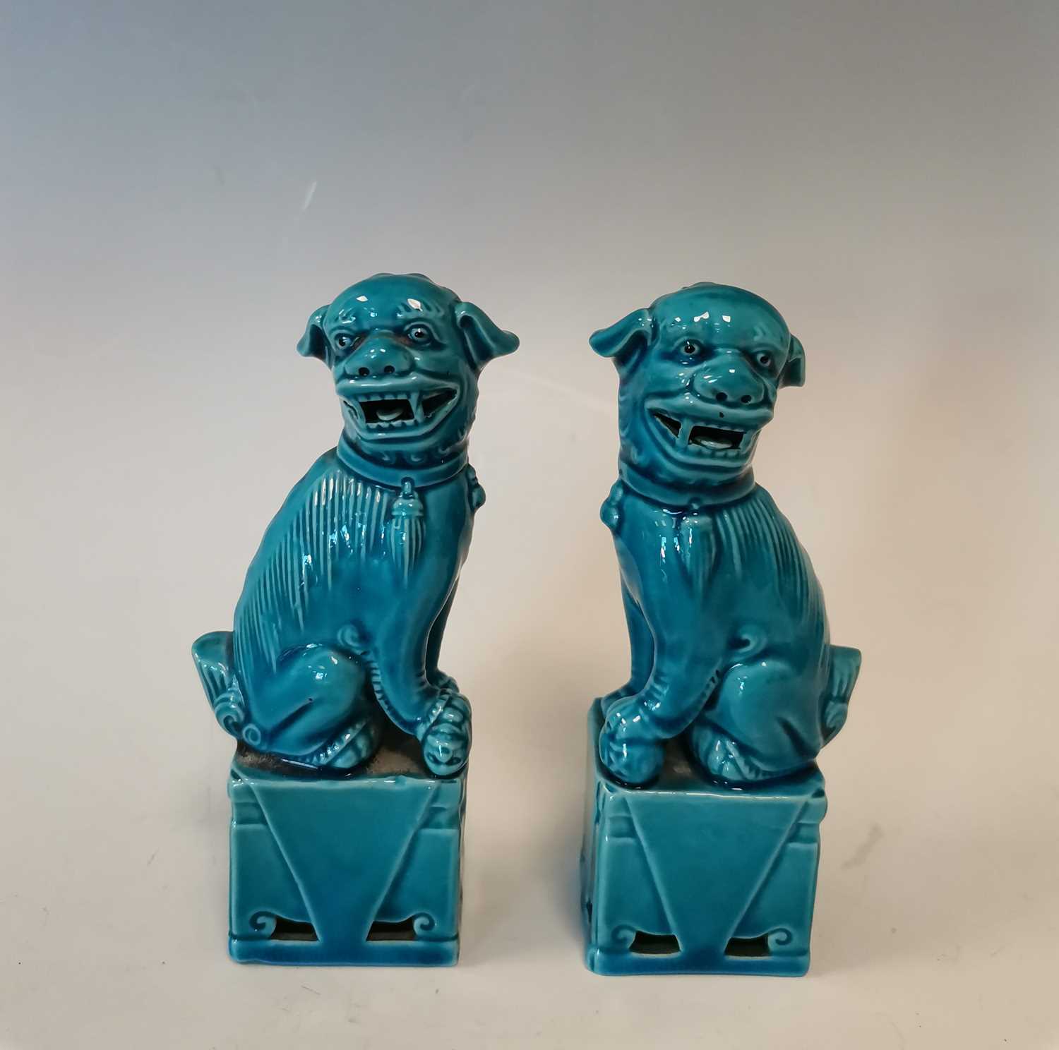 Lot 5 - A pair of Chinese foo dogs. Height: 12cm.