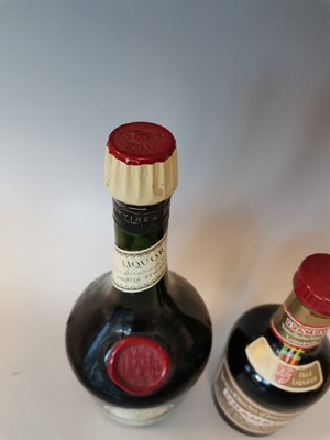Lot 18 - Two vintage sealed bottles of alcohol,...